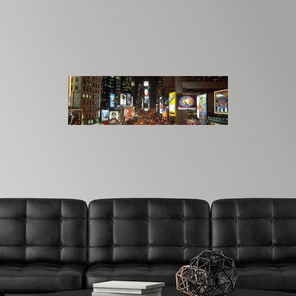 A modern room featuring Night view panorama of NYC cityscape and Times Square.