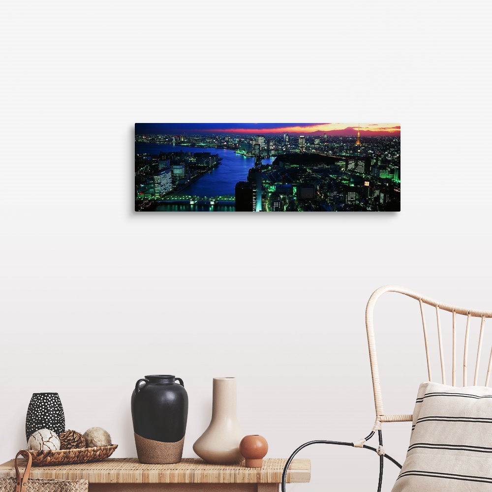 A farmhouse room featuring Panoramic photo on canvas of a lit up downtown cityscape with water flowing through it.