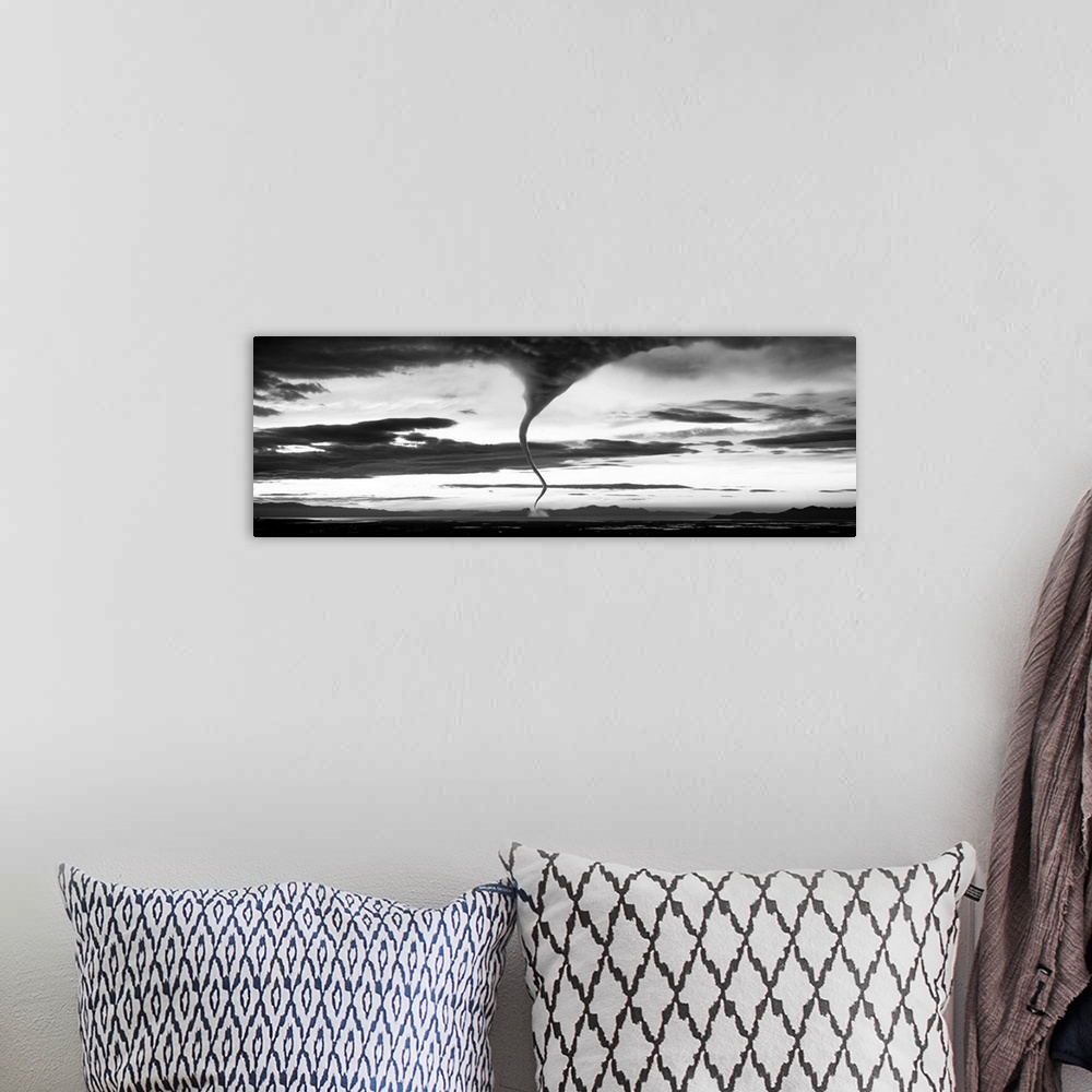 A bohemian room featuring Panoramic photograph of funnel cloud reaching down to earth surrounded by a dark, cloudy, stormy ...