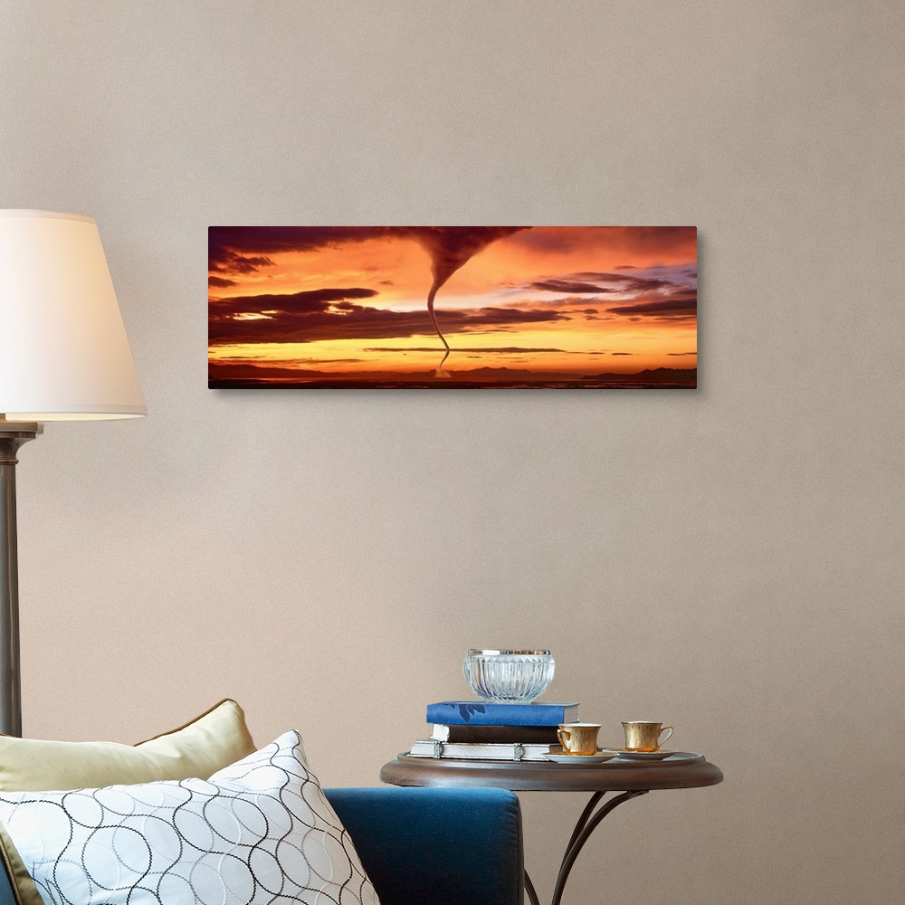 A traditional room featuring A large panoramic shot of a tornado touching down with a sunset sky stretching across the entire ...