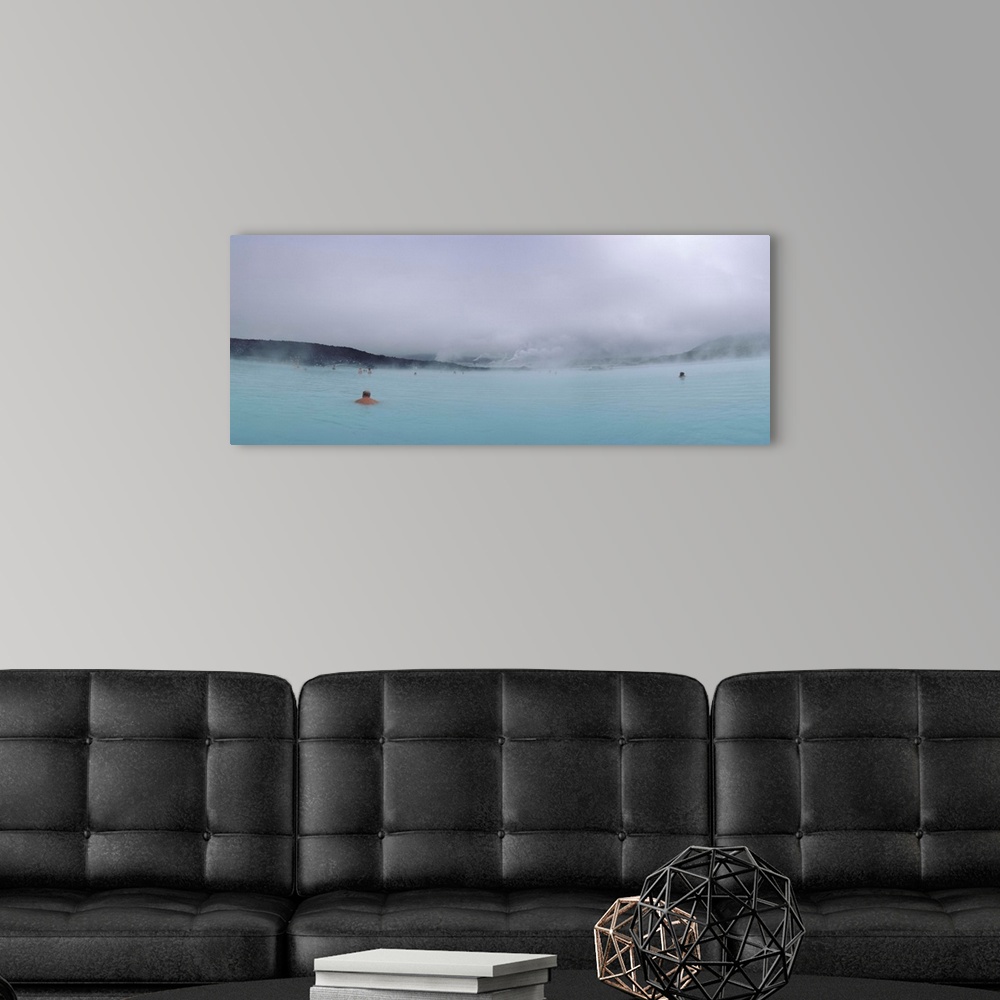 A modern room featuring Tourist swimming in a thermal pool, Blue Lagoon, Reykjanes Peninsula, Reykjavik, Iceland