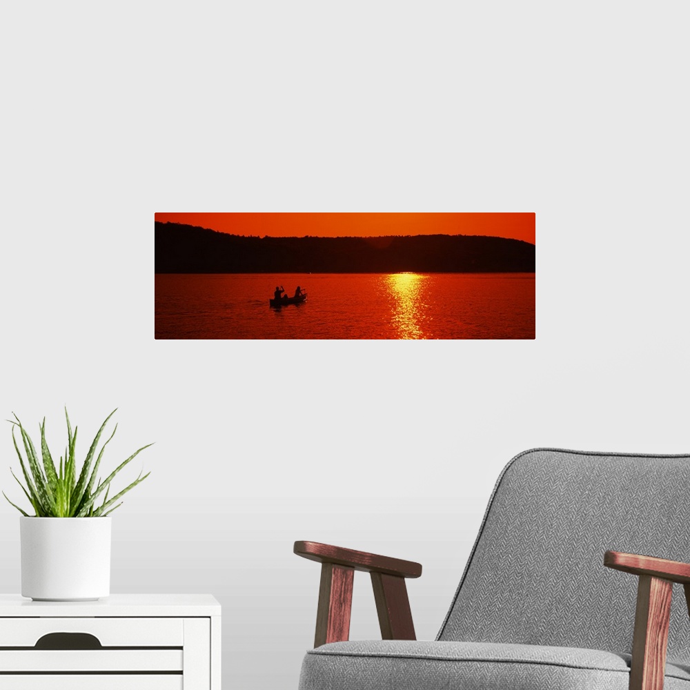 A modern room featuring Tourists canoeing in a lake at sunset, Oquaga Lake, Deposit, Broome County, New York State