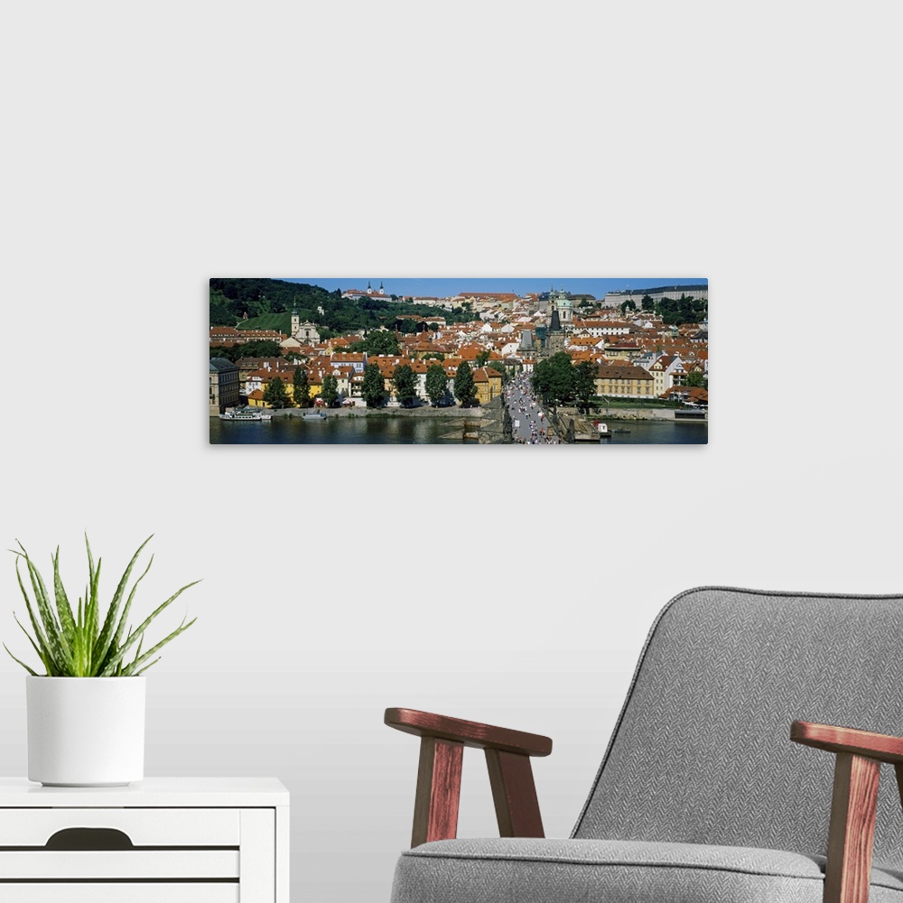 A modern room featuring Tourists on a bridge, Charles Bridge, Vltava River, Prague, Czech Republic