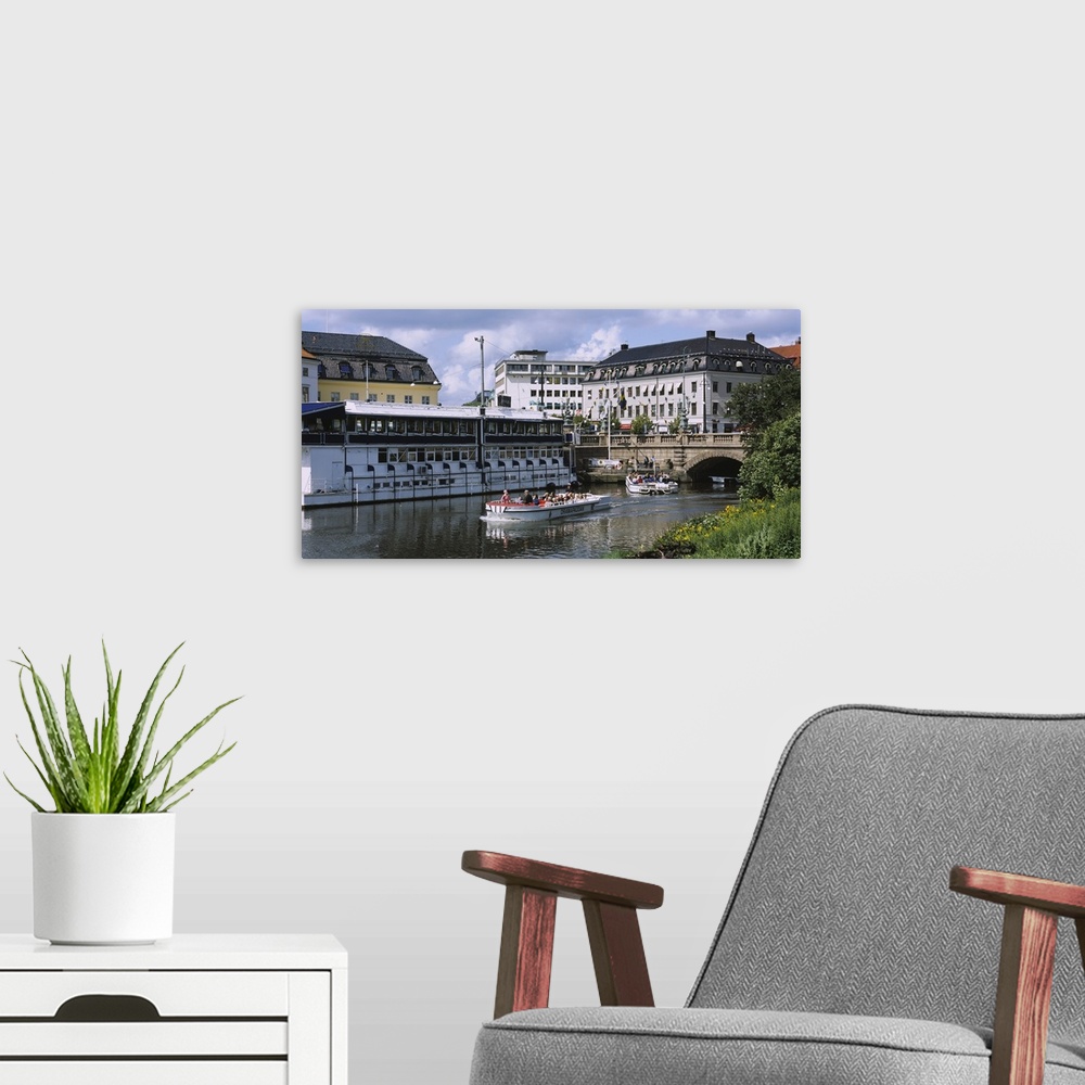 A modern room featuring Tourists on boats in a river, Vall Graven Channel, Gothenburg, Sweden