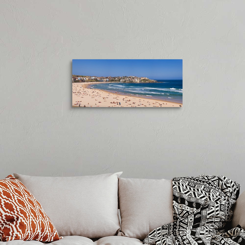 A bohemian room featuring Tourists on the beach Bondi Beach Sydney New South Wales Australia