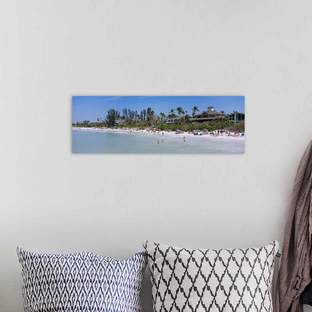 A bohemian room featuring Tourists on the beach, Naples Beach, Gulf of Mexico, Naples, Florida