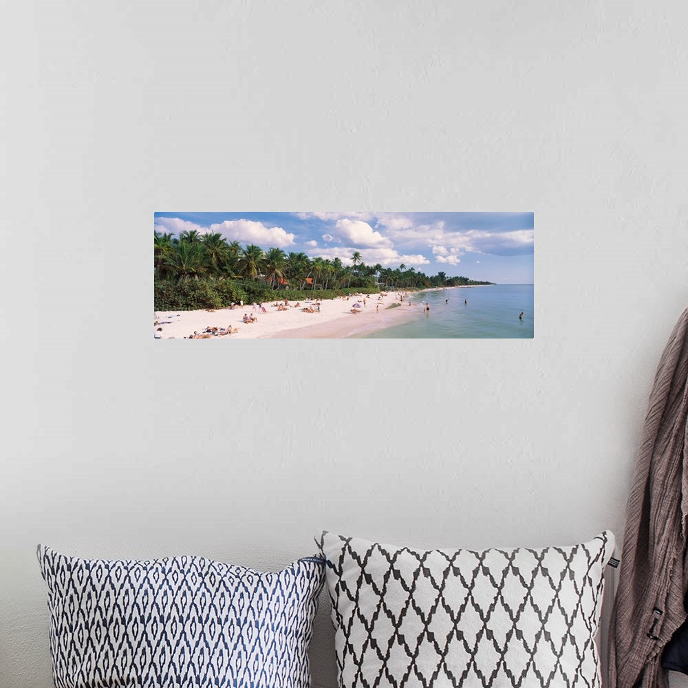 A bohemian room featuring Tourists on the beach, Naples, Gulf of Mexico, Florida