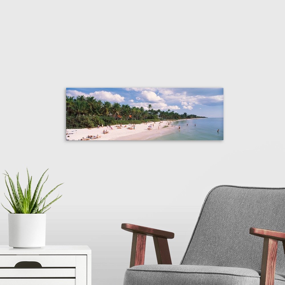 A modern room featuring Tourists on the beach, Naples, Gulf of Mexico, Florida