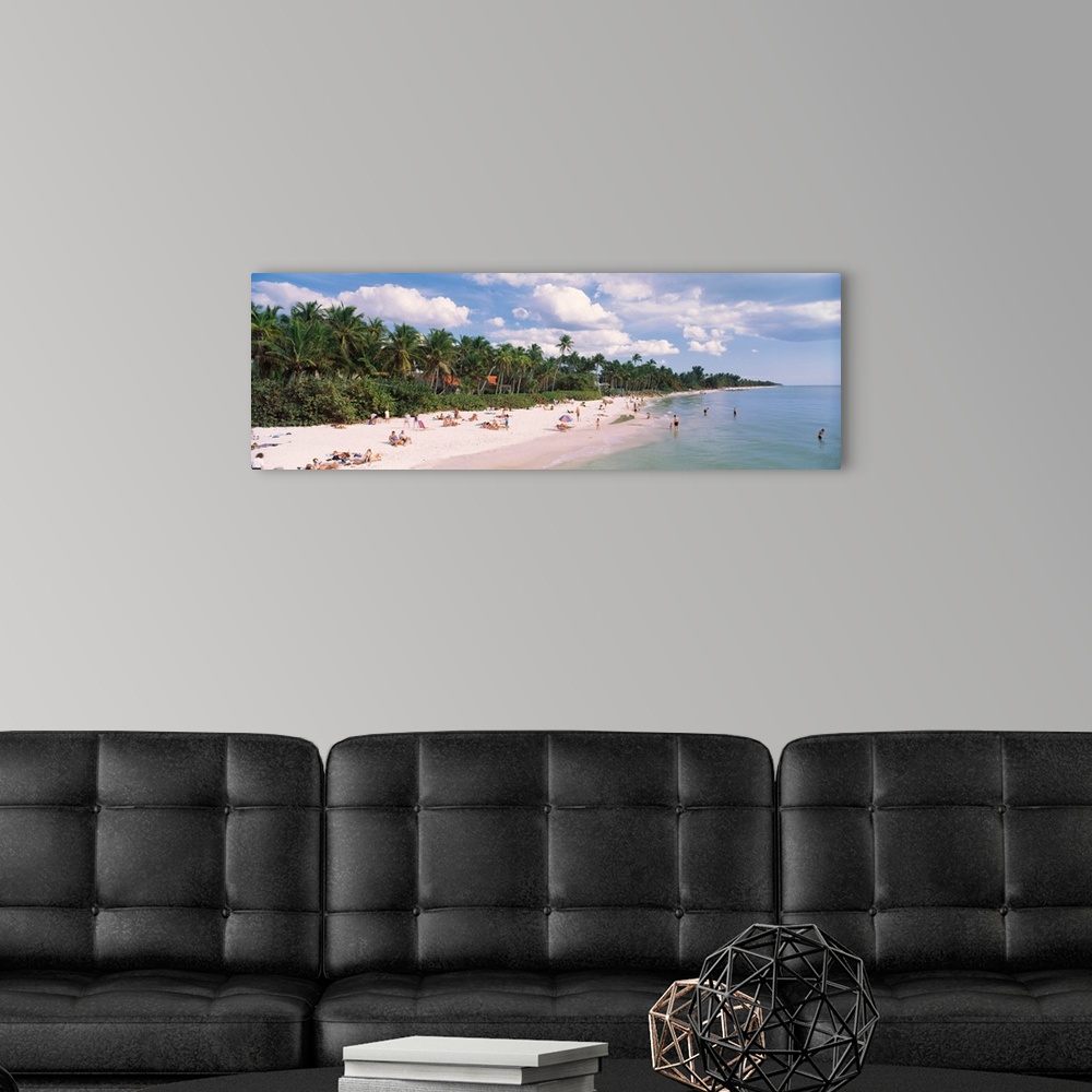 A modern room featuring Tourists on the beach, Naples, Gulf of Mexico, Florida