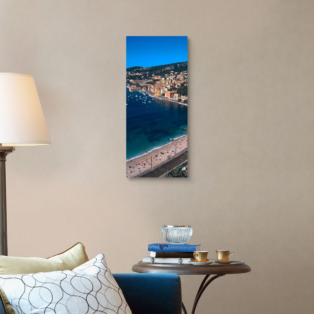 A traditional room featuring Tourists on the beach, Villefranche Sur Mer, Alpes Maritimes, Provence Alpes Cote dAzur, France