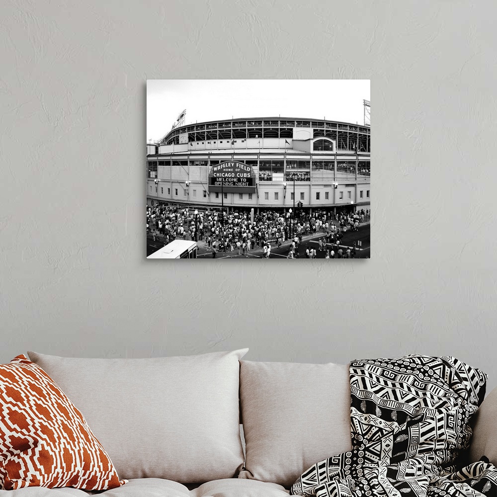 A bohemian room featuring A black and white photograph taken outside of the Chicago Cubs stadium as fans are shown entering...