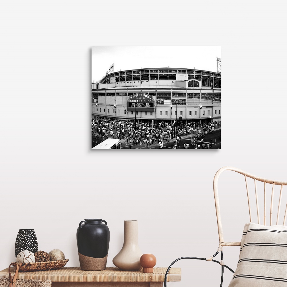 A farmhouse room featuring A black and white photograph taken outside of the Chicago Cubs stadium as fans are shown entering...