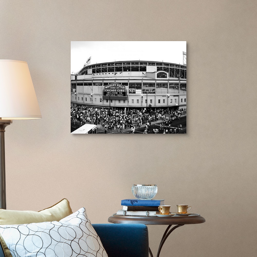 A traditional room featuring A black and white photograph taken outside of the Chicago Cubs stadium as fans are shown entering...