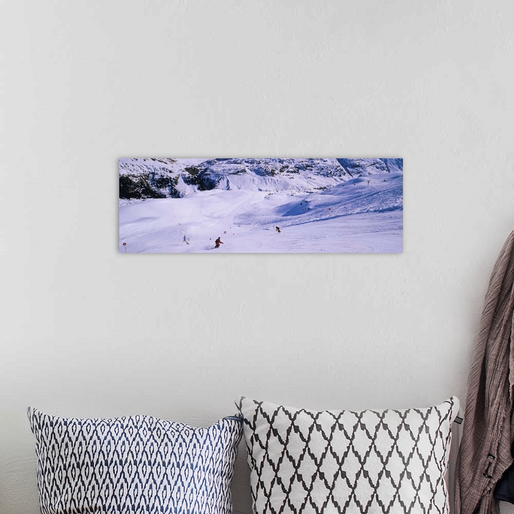 A bohemian room featuring Tourists skiing on snow, Zurs, Austria