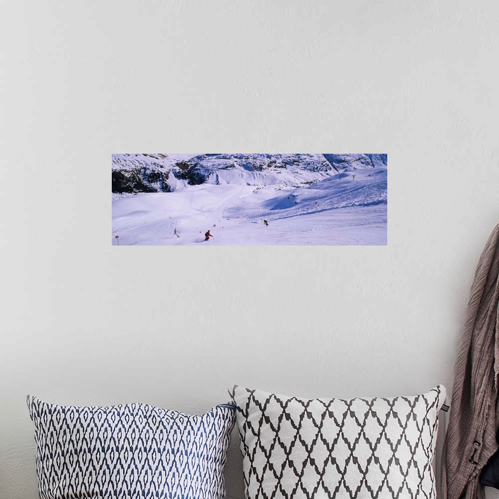 A bohemian room featuring Tourists skiing on snow, Zurs, Austria