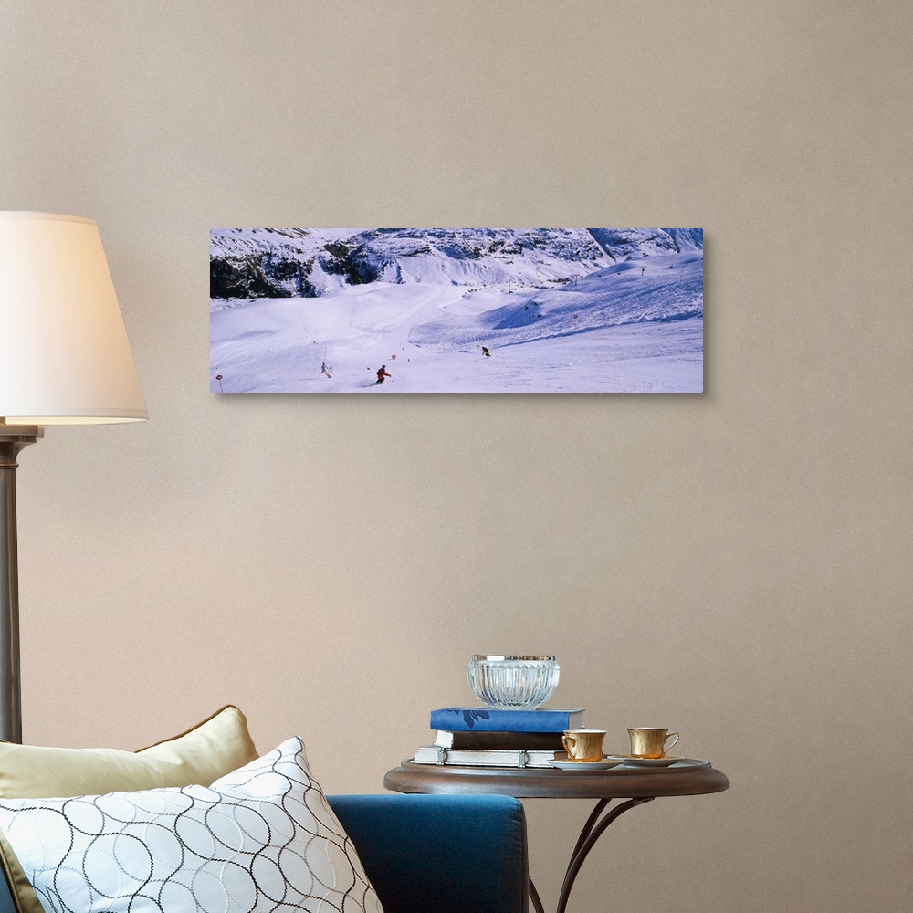 A traditional room featuring Tourists skiing on snow, Zurs, Austria