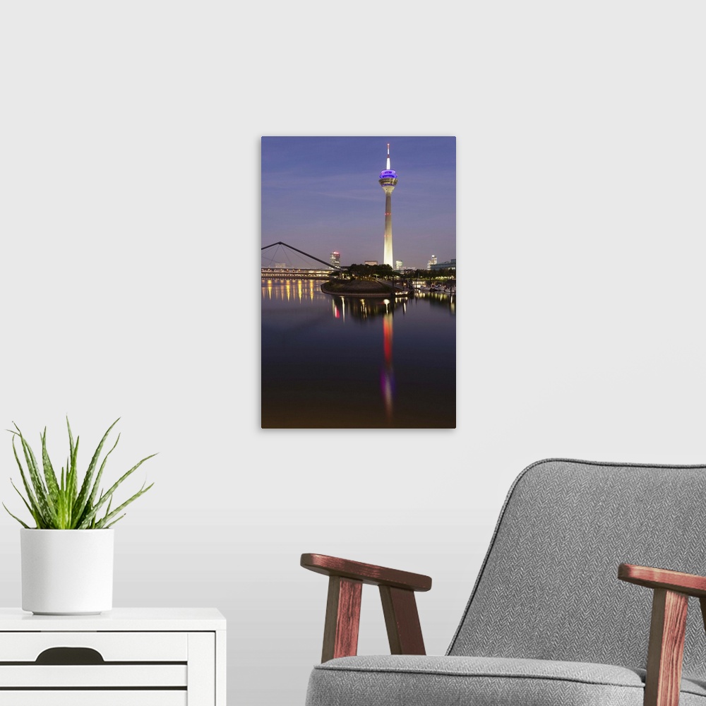 A modern room featuring Tower at a harbor, Rheinturm Tower, Media Harbour, Dusseldorf, Germany