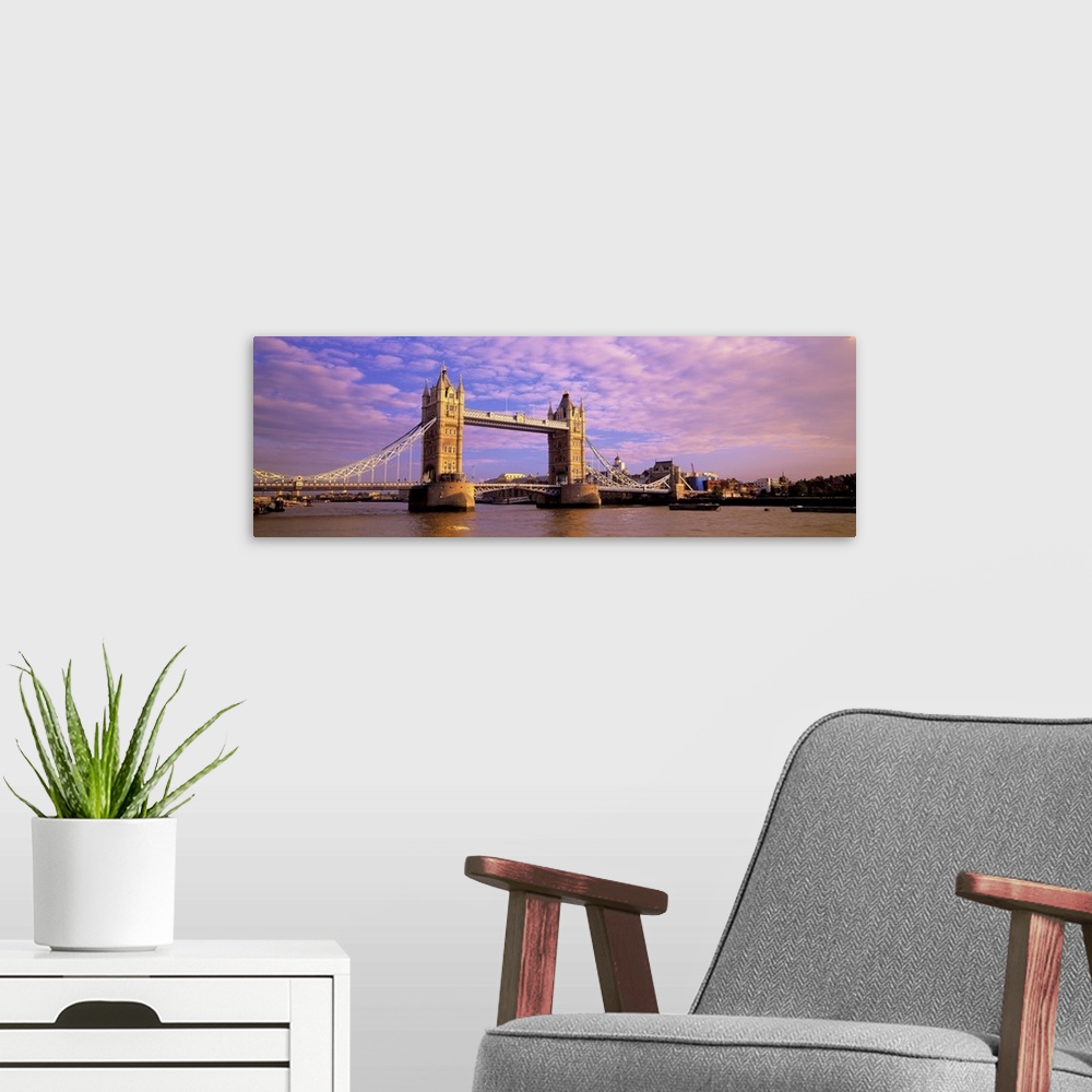 A modern room featuring Daytime panorama of London's Tower Bridge, which crosses the River Thames.