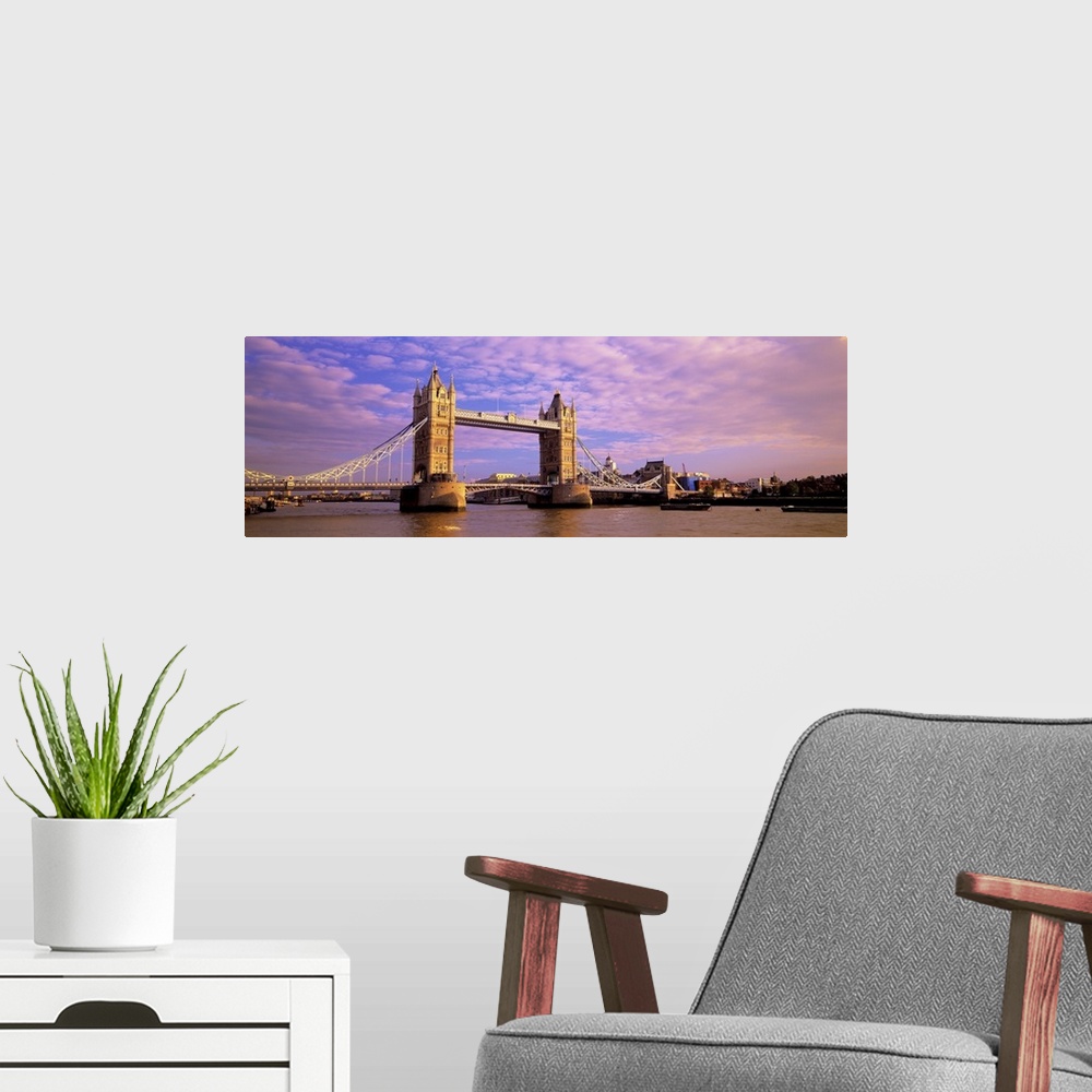 A modern room featuring Daytime panorama of London's Tower Bridge, which crosses the River Thames.