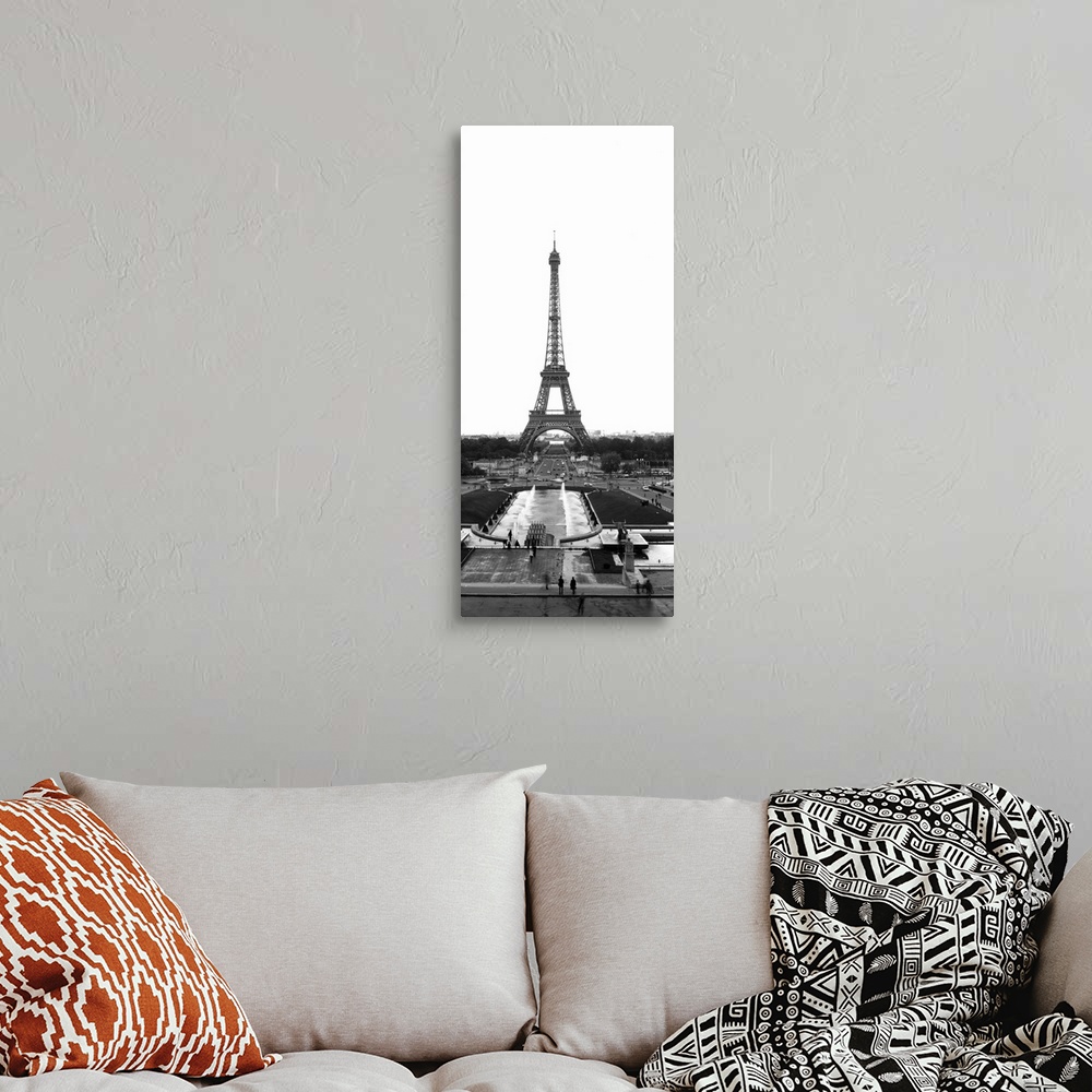 A bohemian room featuring Black and white photograph of the Eiffel Tower as seen from the edge of the plaza. The tower cont...