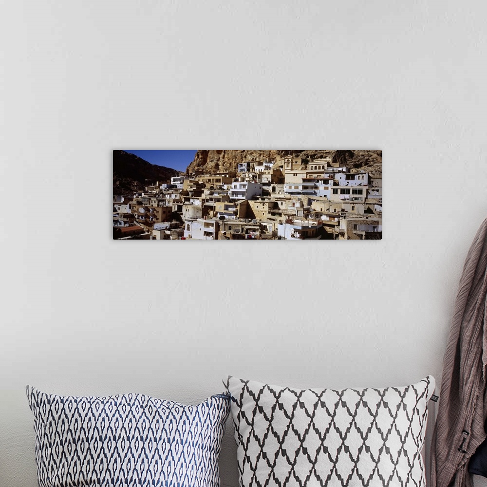 A bohemian room featuring Town on a hillside, Maaloula, Syria