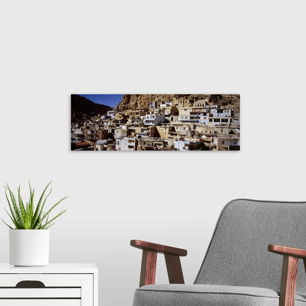 A modern room featuring Town on a hillside, Maaloula, Syria