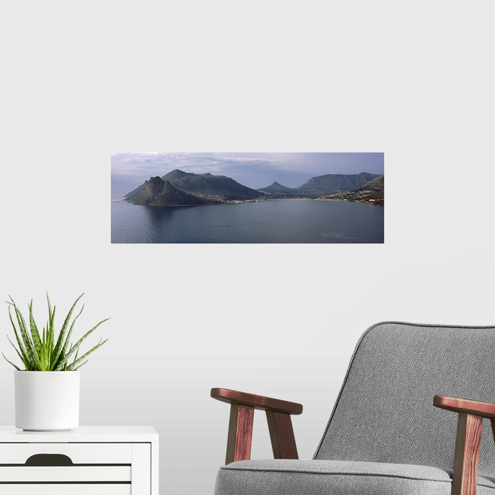 A modern room featuring Town surrounded by mountains, Hout Bay, Cape Town, Western Cape Province, Republic of South Africa