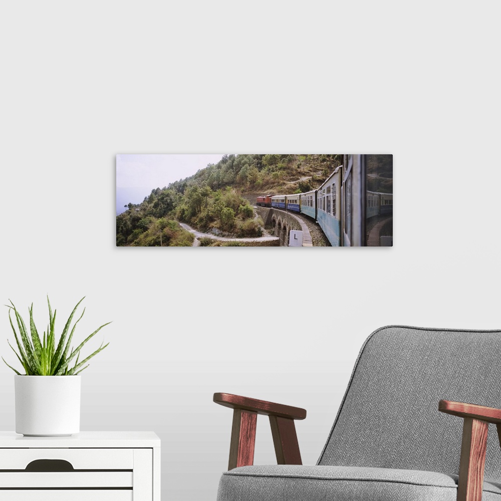 A modern room featuring Toy train passing over a bridge, Himachal Pradesh, India