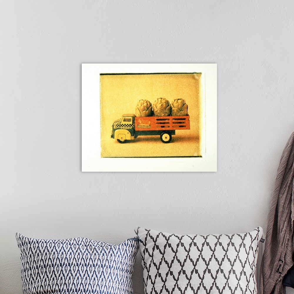 A bohemian room featuring Toy truck carrying artichokes