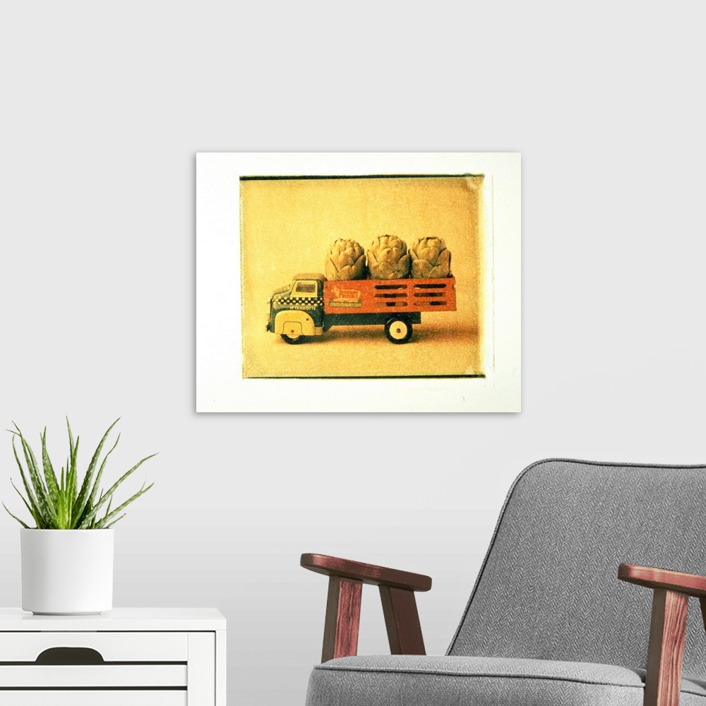 A modern room featuring Toy truck carrying artichokes