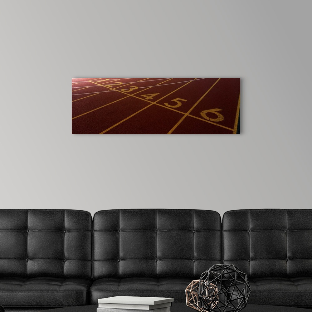 A modern room featuring Up-close panoramic photograph of track markings with lines and numbers designating lanes.