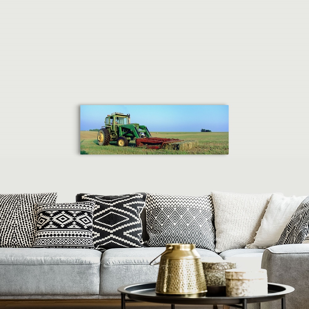 A bohemian room featuring Tractor in a hay field, Jackson County, Kansas