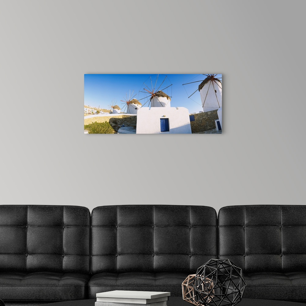 A modern room featuring Traditional windmill in a village, Mykonos, Greece