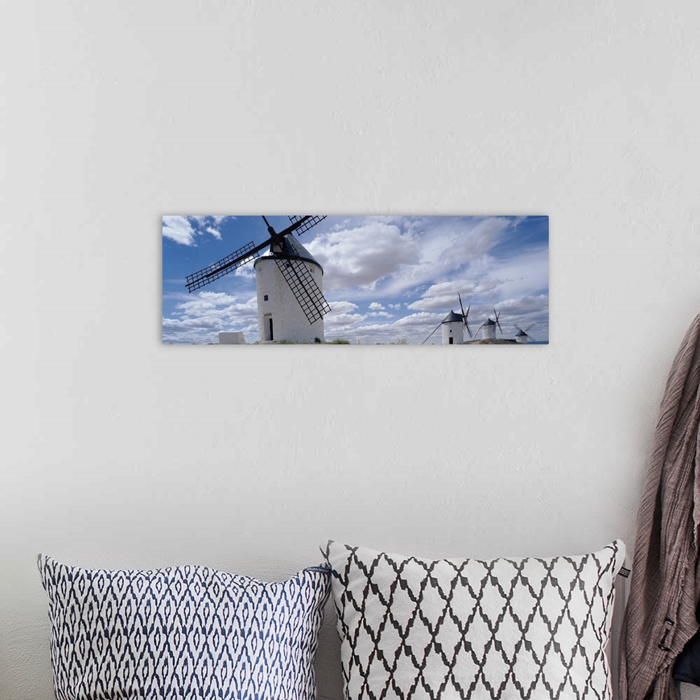 A bohemian room featuring Traditional windmills in a row, Consuegra, Toledo Province, Castilla La Mancha, Spain
