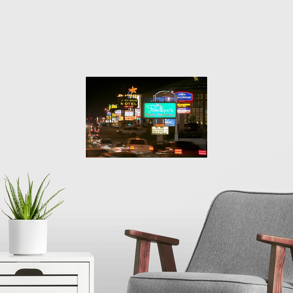 A modern room featuring Traffic moving on a road at night, Route 76, Country Music Boulevard, Branson, Missouri