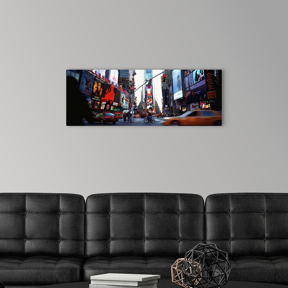 A modern room featuring Panorama of Times Square in downtown New York City.