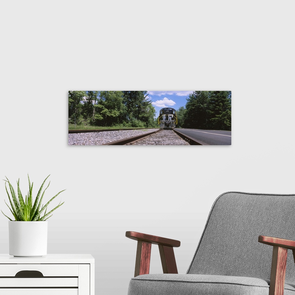 A modern room featuring Train on a railroad track, Thendara Station, Adirondack Mountains, Thendara, Old Forge, Herkimer ...