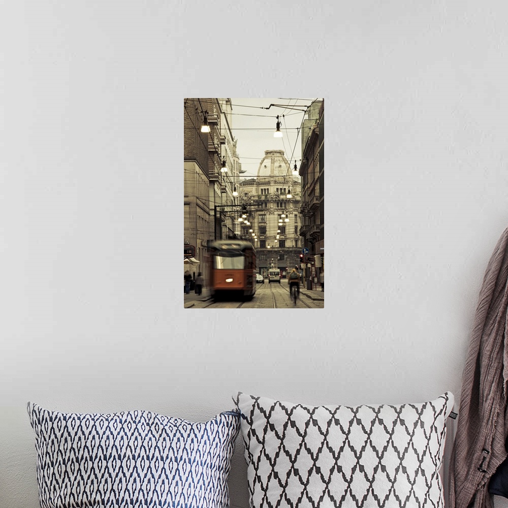 A bohemian room featuring Tram on a street, Piazza Del Duomo, Milan, Lombardy, Italy