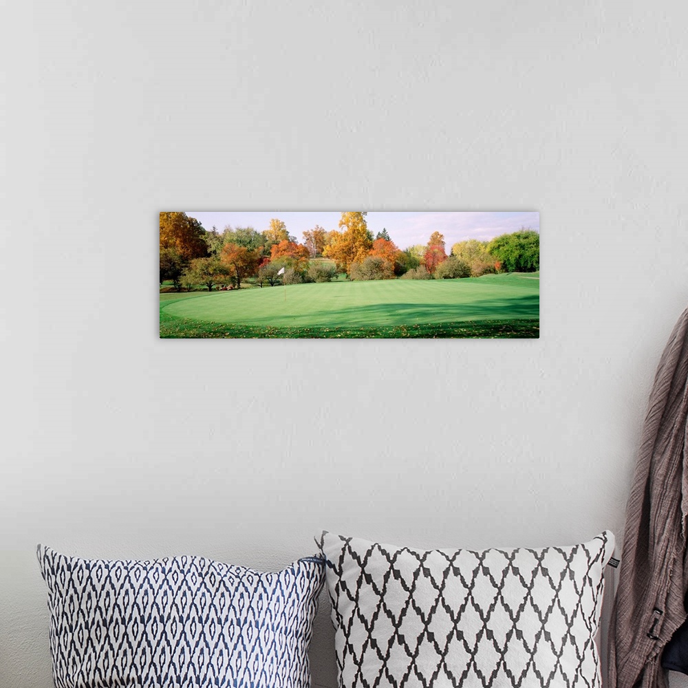 A bohemian room featuring Trees on a golf course