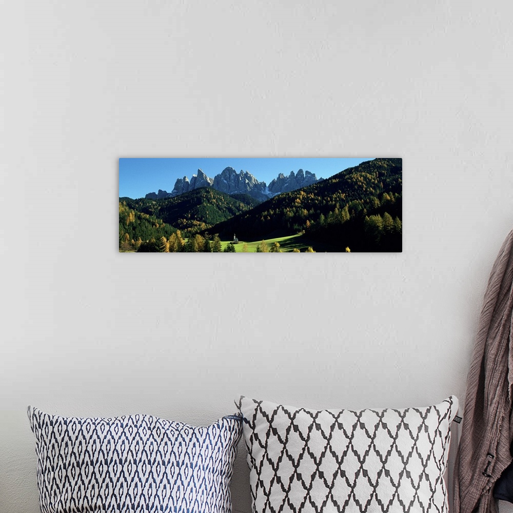 A bohemian room featuring Trees on a landscape, Dolomites, Funes Valley, Le Odle, Santa Maddalena, Tyrol, Italy