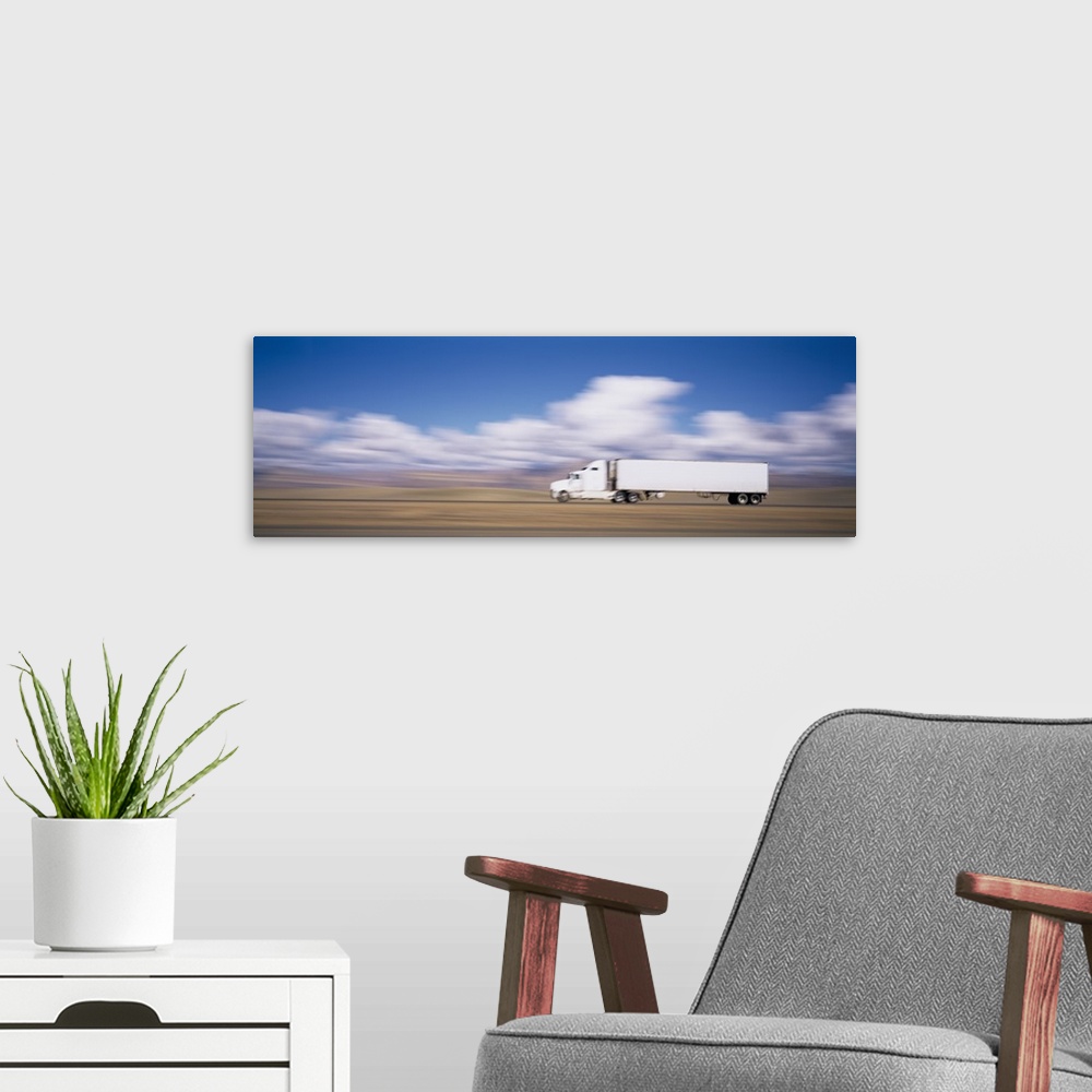 A modern room featuring Truck on the road, Interstate 70, Green River, Utah