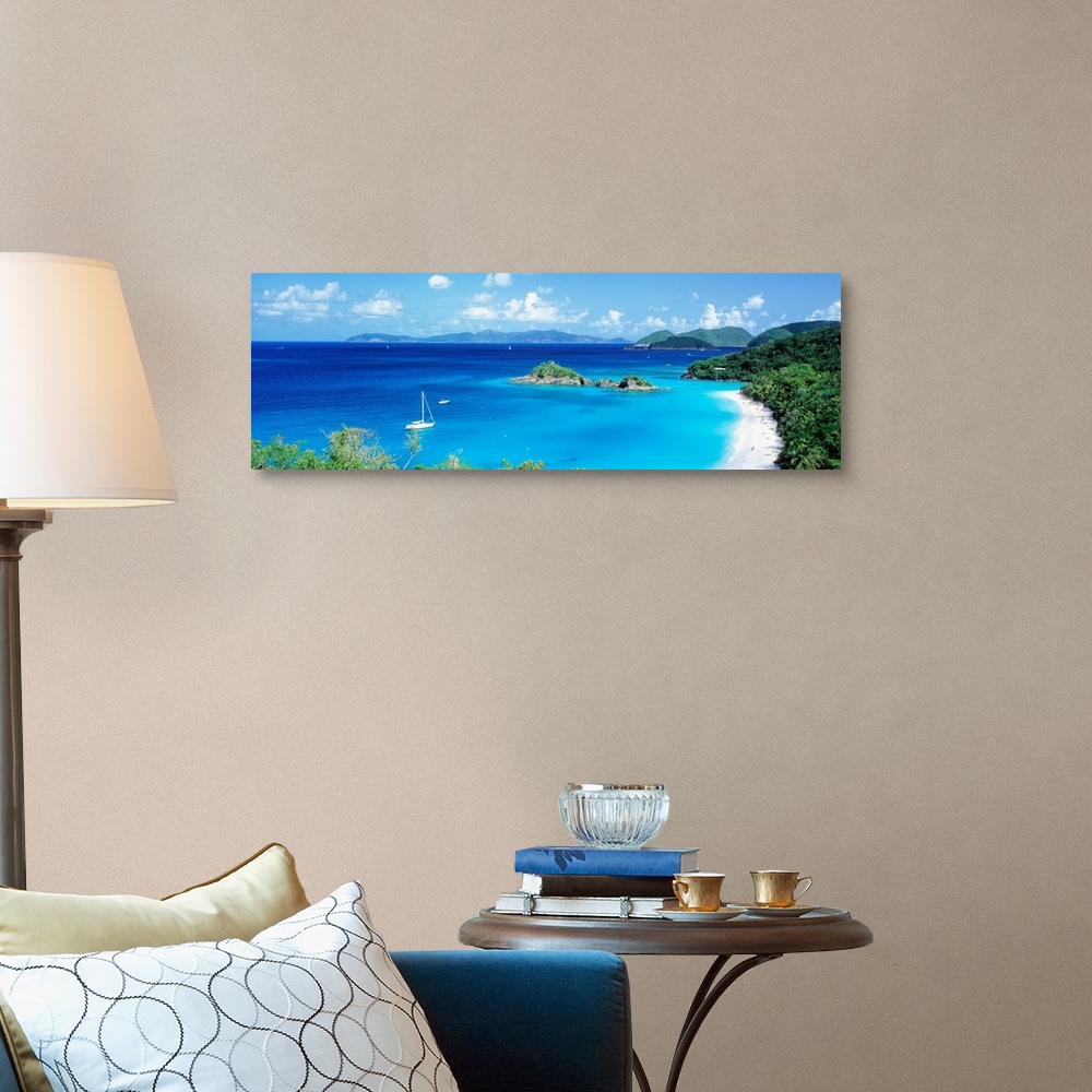 A traditional room featuring Panoramic photograph of a couple boats sitting in the clear waters of Trunk Bay in the Virgin Isl...