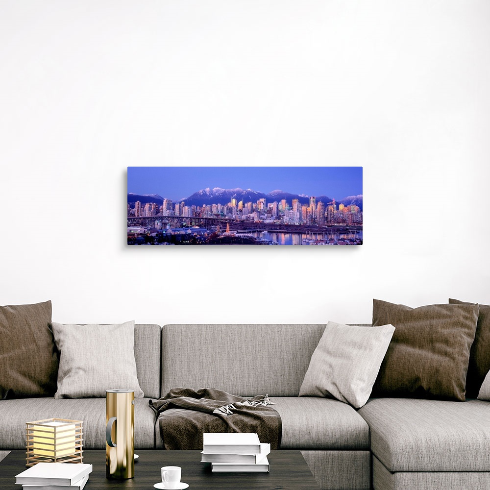A traditional room featuring The city skyline is packed with skyscrapers and a harbor full of boats is built into the shore in...