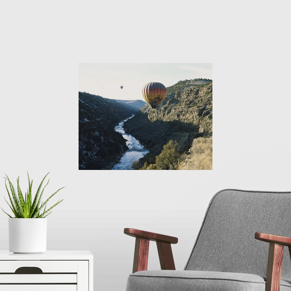 A modern room featuring Two hot air balloons in the sky, Taos County, New Mexico