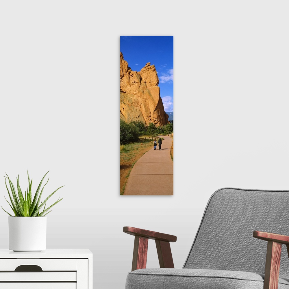 A modern room featuring Two people walking along a path, Garden of the Gods, Colorado Springs, Colorado