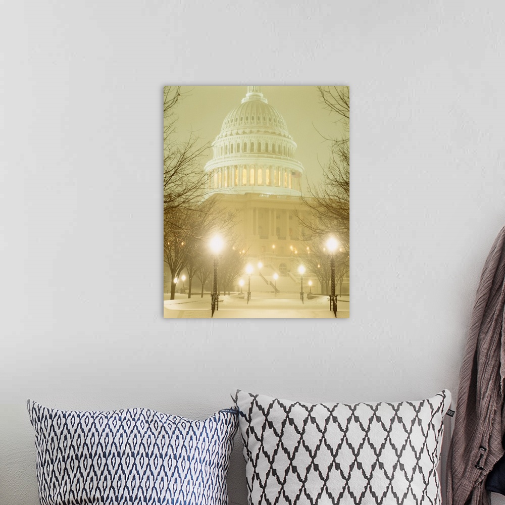 A bohemian room featuring Big canvas photo art of an up close shot of the US Capitol Building that is lit up with snow on t...