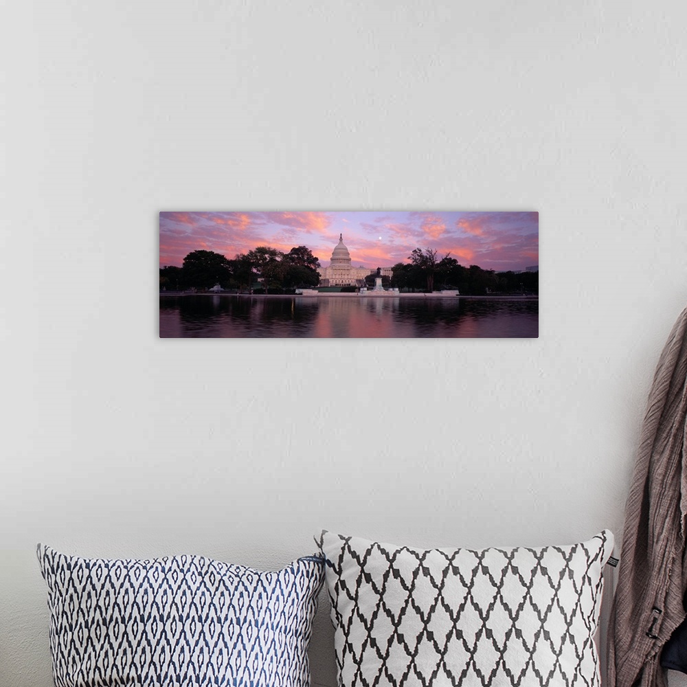 A bohemian room featuring Panoramic image of the United States Capitol Building in Washington DC from the water.