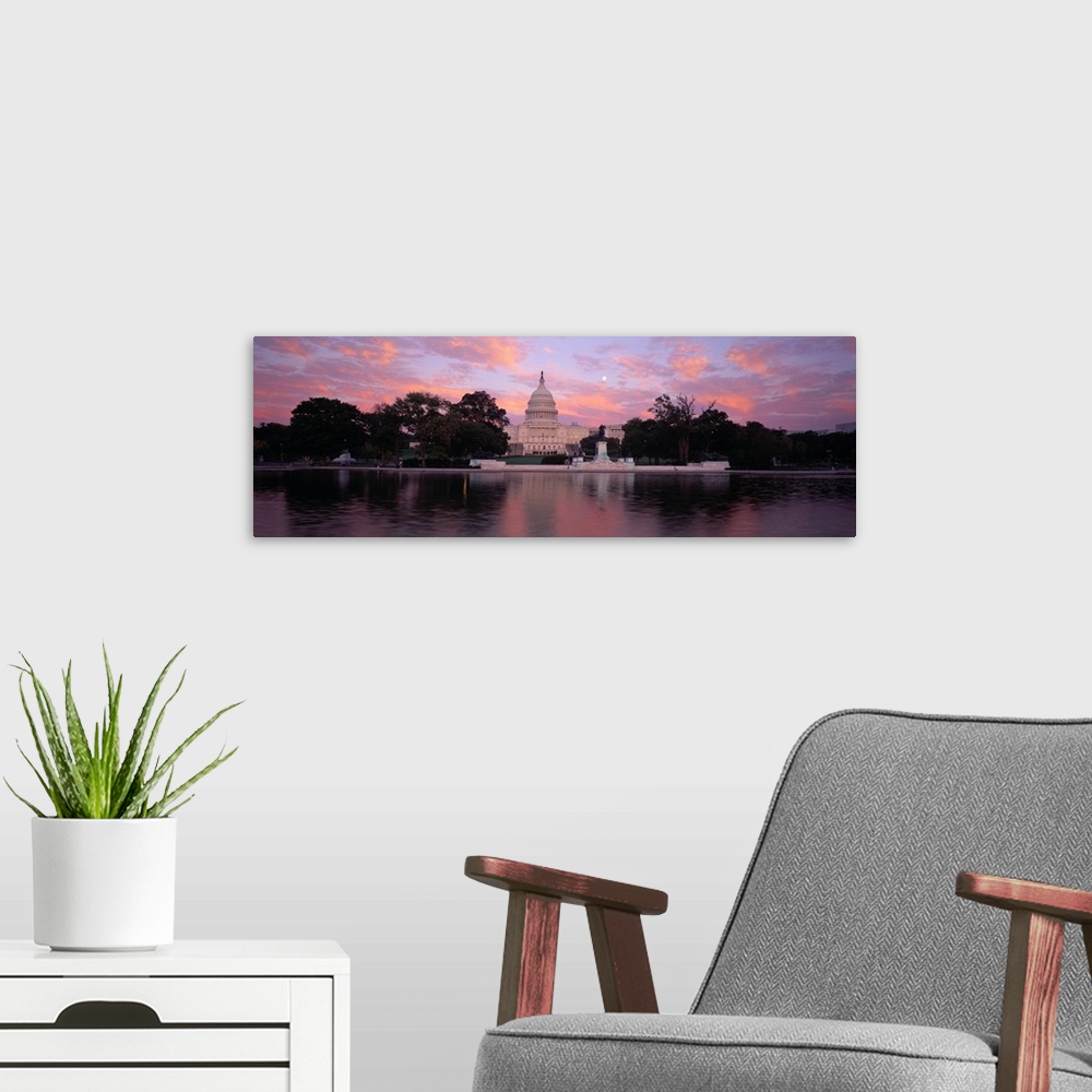 A modern room featuring Panoramic image of the United States Capitol Building in Washington DC from the water.