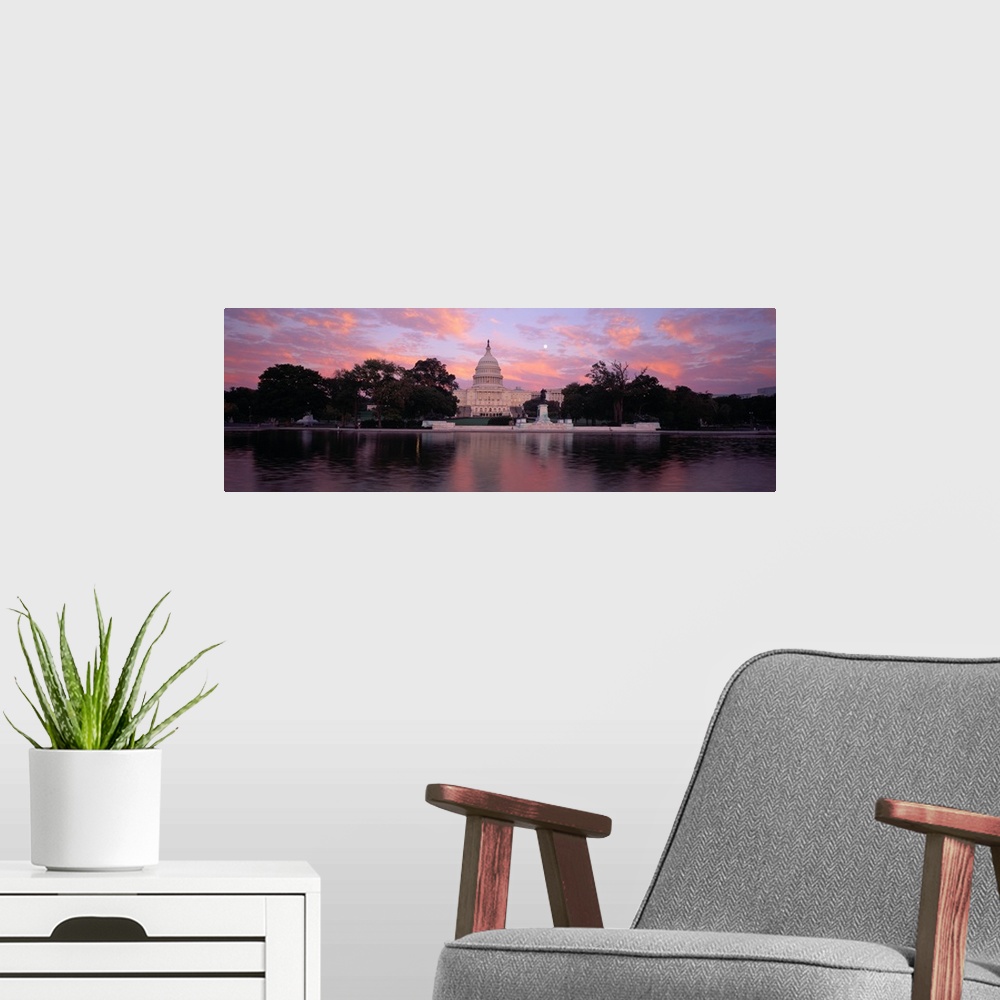 A modern room featuring Panoramic image of the United States Capitol Building in Washington DC from the water.