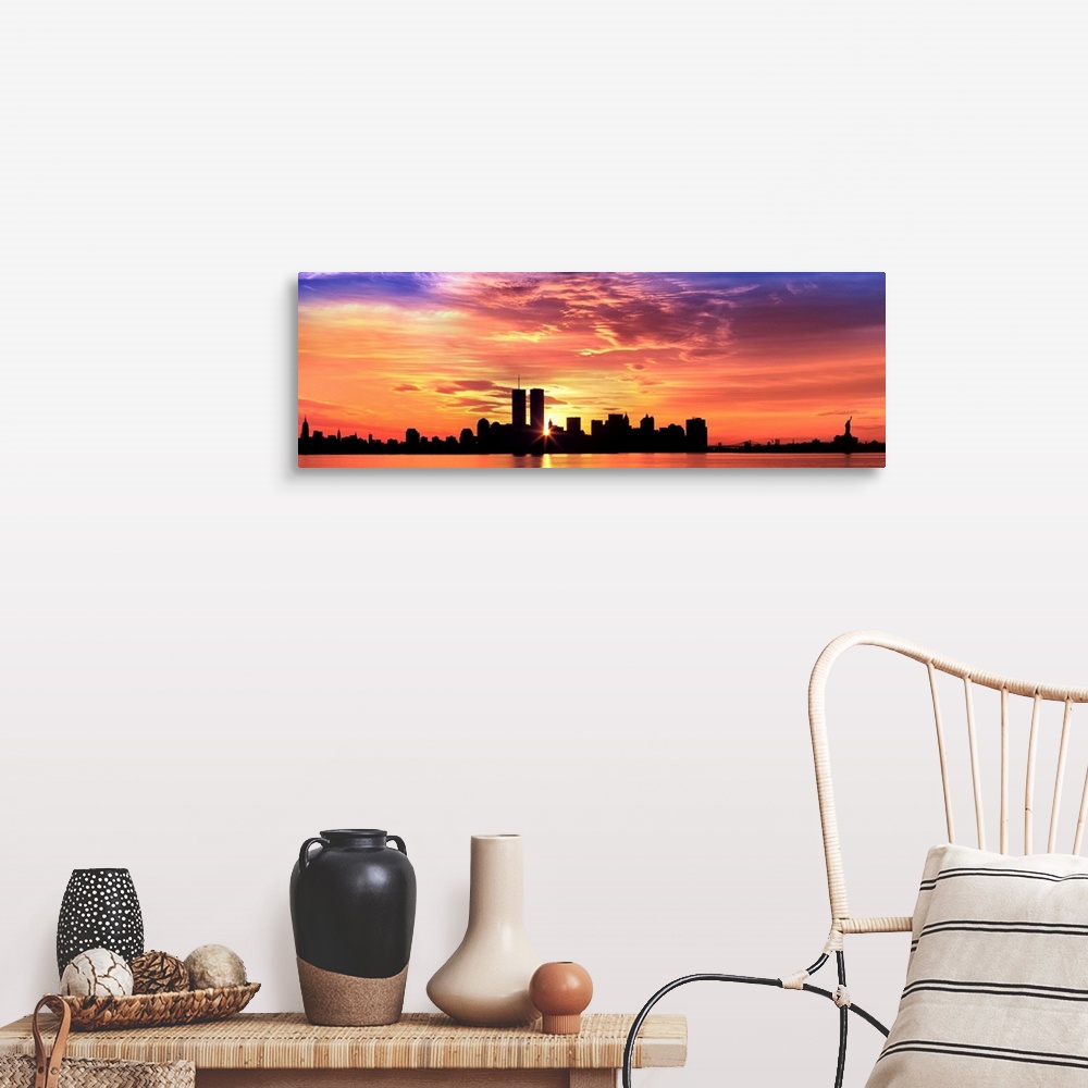 A farmhouse room featuring Panoramic photograph of the NY City skyline with the sun peering through the buildings with the H...